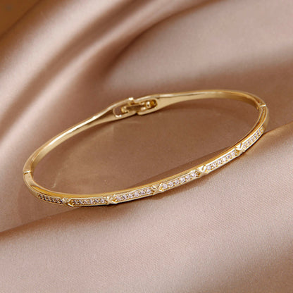 Various Styles Of Gold CZ Plated Bangles