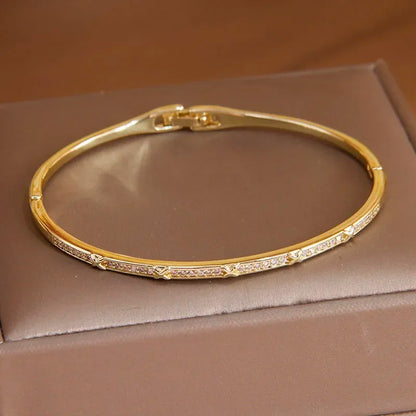 Various Styles Of Gold CZ Plated Bangles