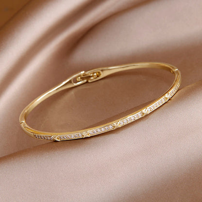 Various Styles Of Gold CZ Plated Bangles