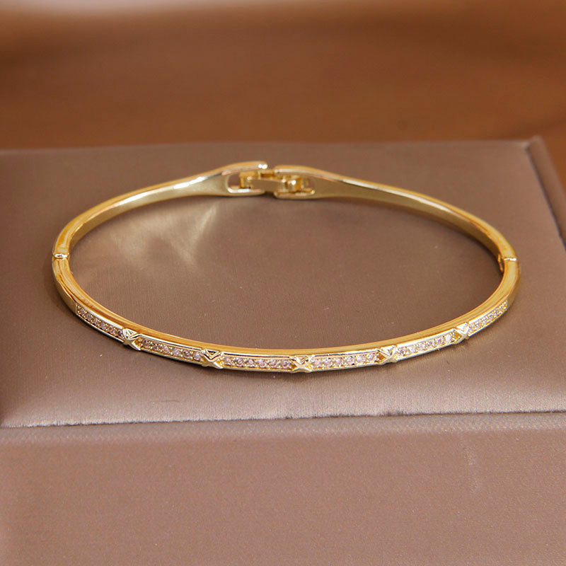 Various Styles Of Gold CZ Plated Bangles