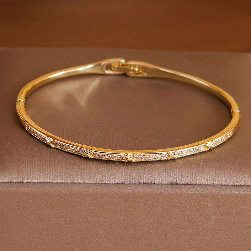 Various Styles Of Gold CZ Plated Bangles