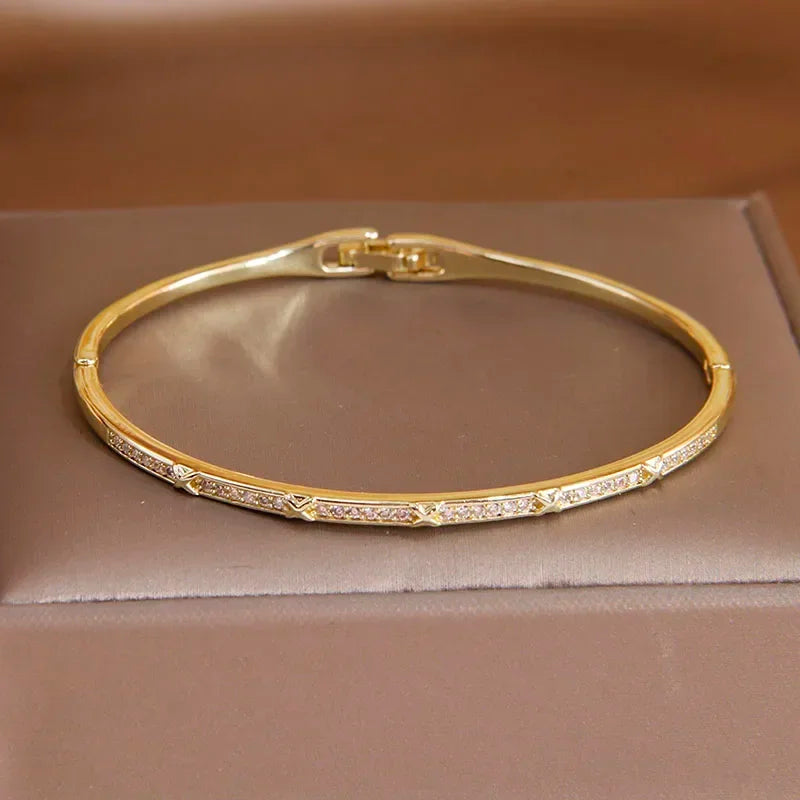 Various Styles Of Gold CZ Plated Bangles