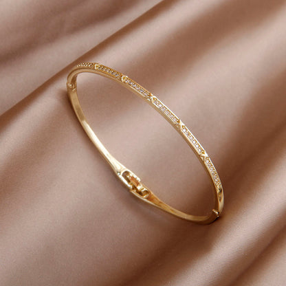 Various Styles Of Gold CZ Plated Bangles